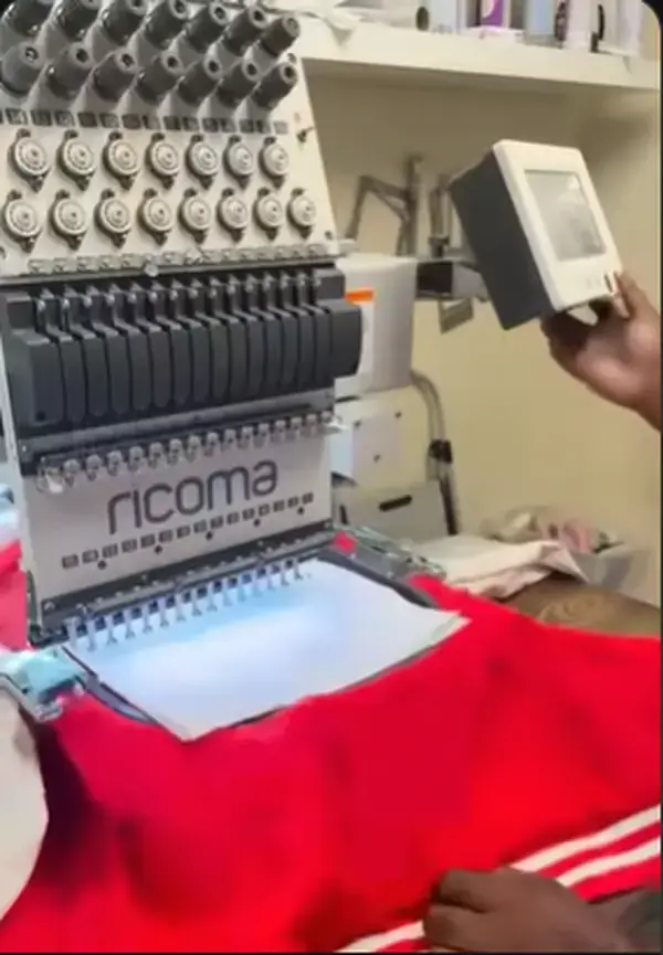 Red apparel on an embroidery machine